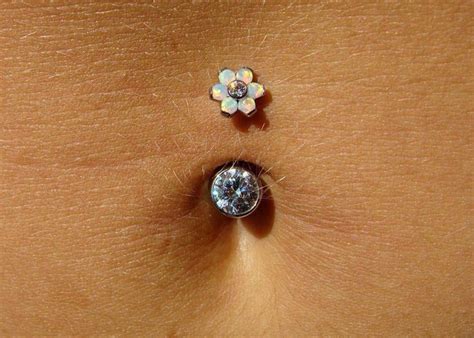 how long can you not swim after a belly button piercing? The impact of piercings on your body